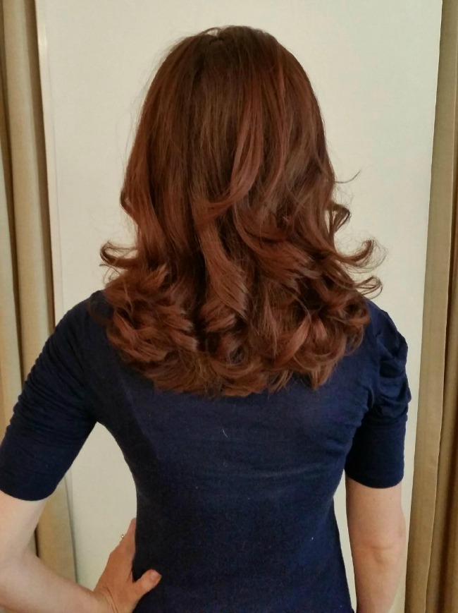 Hair Style: Dyed with a red gloss and blown out curly with no hot tools used!